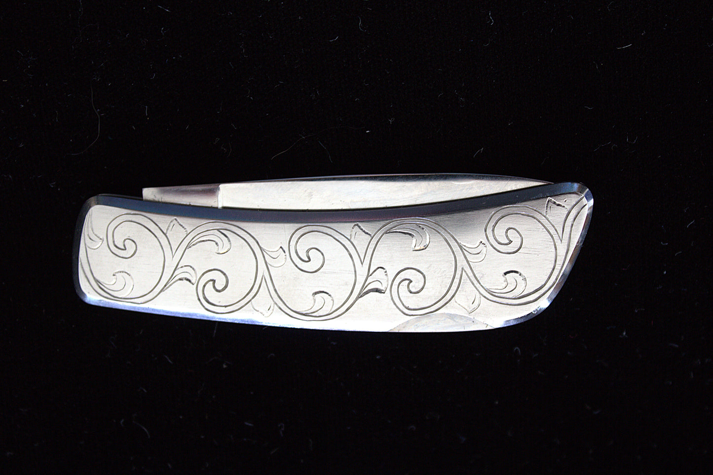 Engraved Floral Scroll Folding Knife